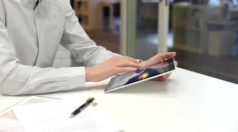 Man working on tablet pc in start-up Stock Footage 43743885