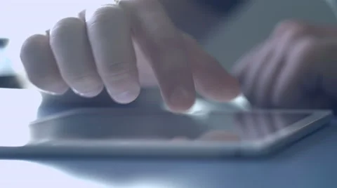 Man working for the Tablet PC at your desk Stock Footage 47752976