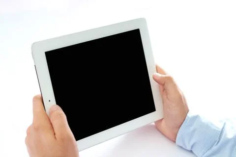 Man working on a tablet. Stock Photos