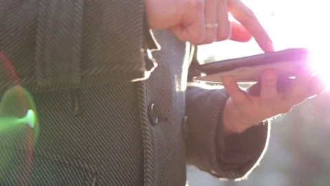 A man working on a tablet at sunset Stock Footage 73412364