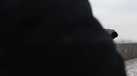 Man working on a tablet in the winter Stockbeeldmateriaal 59909978