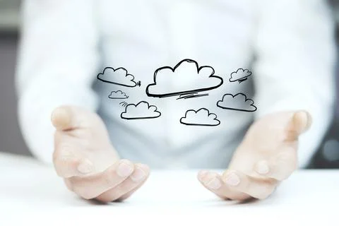 Man working with touch screen- clouds Stock Photos