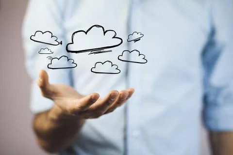 Man working with touch screen- clouds Stock Photos