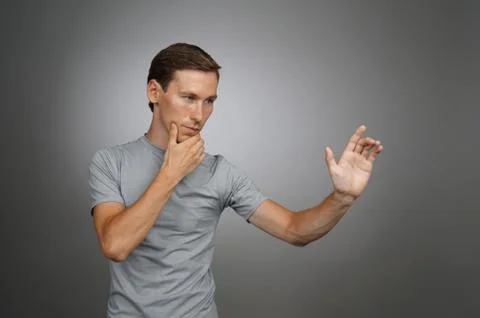 Man working with transparent virtual interface screen Stock Photos