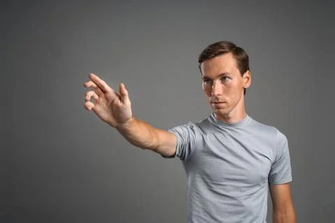 Man working with transparent virtual interface screen Stock Photos