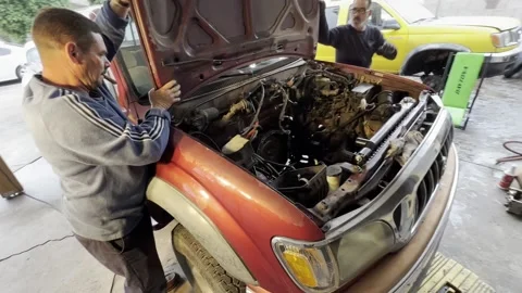 Man Working on Truck Engine Auto Mechanic Stock Footage 239581813