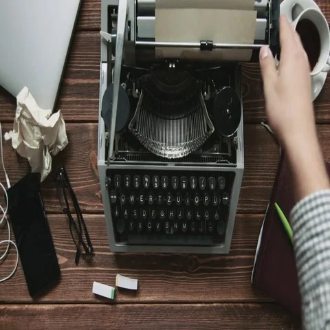 Man working on typewriter Stock Footage 69544482