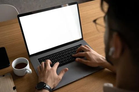 Man working using laptop with blank white screen mockup template Stock Photos