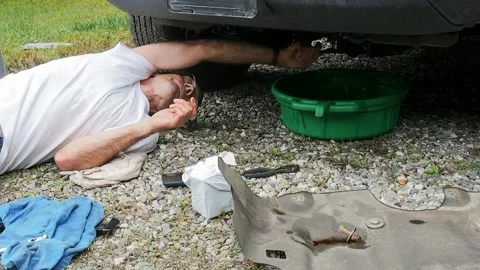 Man working on vehicle Stock Footage 212145049