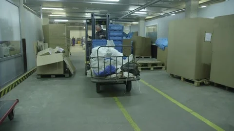 Man working in a warehouse Stock Footage 60129612