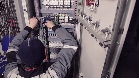Man working with wires in electric meter. Stock-Footage 77006967