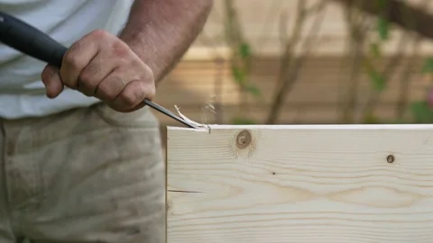 Man working with wood using chisel Stock Footage 135526188