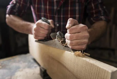 Man working with wood workshop Stock Photos