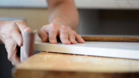 Man working with wooden panel Stock Footage 95116419