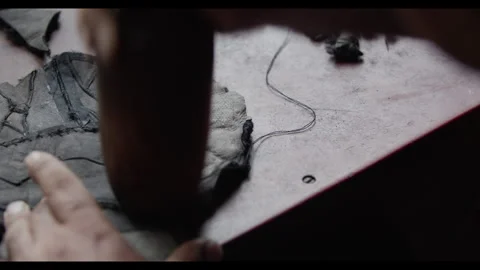 Man working with wool and leather with his hands Video stock 271250281
