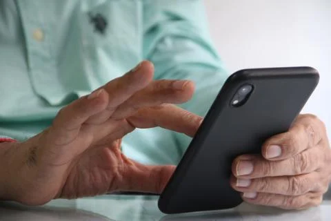 Man working in workplace on mobile in Digital world Stock Photos