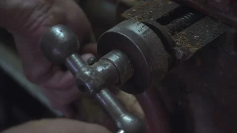 Man working in a workshop on clamp in slow motion 180fps Stock Footage 109184824