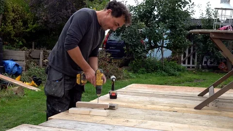 Man working in workshop Stock Footage 95182095