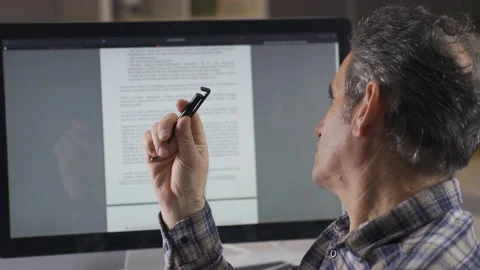 Man working on written document. Stock Footage 224634097