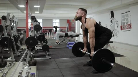 Man workout barbell in the gym Stock Footage 56636983