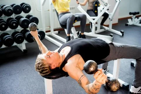 Man workout at gym Stock Photos