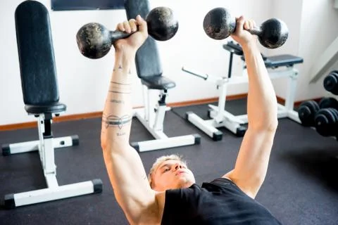 Man workout at gym Stock Photos