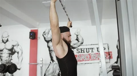 Man workout with power simulator in the gym Stock Footage 56637291