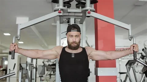 Man workout with power simulator in the gym Stock Footage 56637374