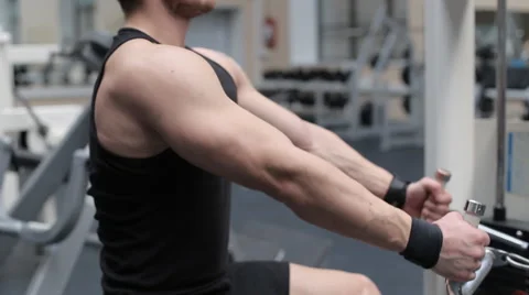 Man workout with power simulator in the gym side muscle shot Video stock 62562786