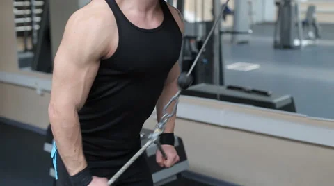 Man workout with power simulator in the gym Stock Footage 62563348