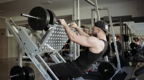 Man workout with simulator platform in the gym Stock Footage 56635769