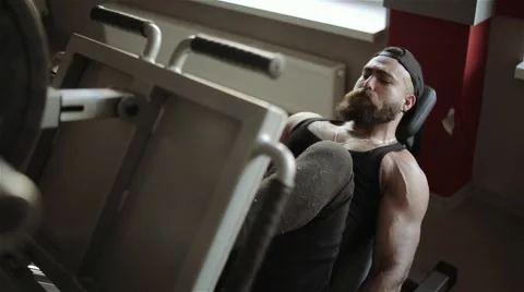 Man workout with simulator platform in the gym Stock Footage 56635806