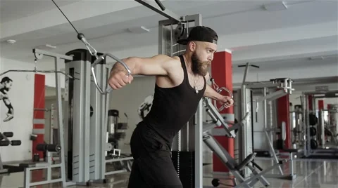 Man workout with trainer crossover in the gym Stock Footage 56637302