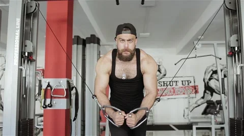 Man workout with trainer crossover in the gym Stock Footage 56637309