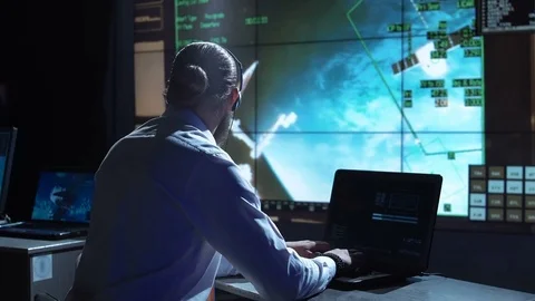 Man at workplace in space center Stock Footage 79079067