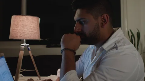 Man Works Back Late in Dark Office at Night, In Deep Thought, Types on Computer Stock Footage 108893592