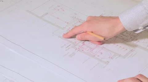 Man works with blueprint Stock Footage 61047684