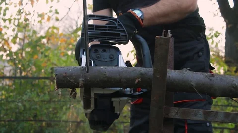 A man works with a chainsaw Video stock 97932063