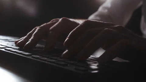 Man works at the computer late at night Stock Footage 118447022