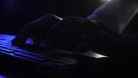 Man works at the computer late at night Stock Footage 118936069