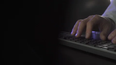 Man works at the computer late at night Stock Footage 120082406