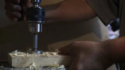 A man works on a drilling machine Stock Footage 132239271
