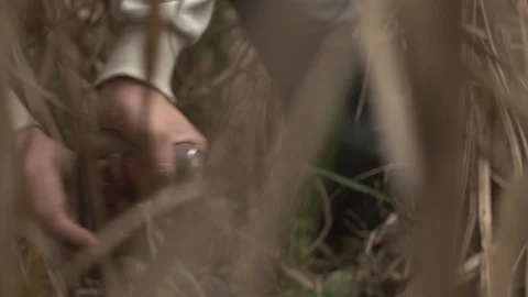  man works the earth with shovel Stock Footage 123799820