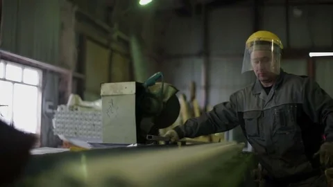 Man works in a factory Stock Footage 82306754