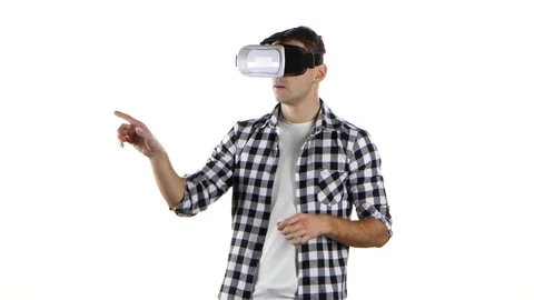 Man works with files in virtual reality glasses. White background Stock Footage