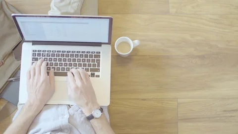 Man works on floor Stock Footage 72393452