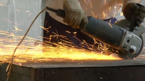 Man works as a grinder Stock Footage 77751675