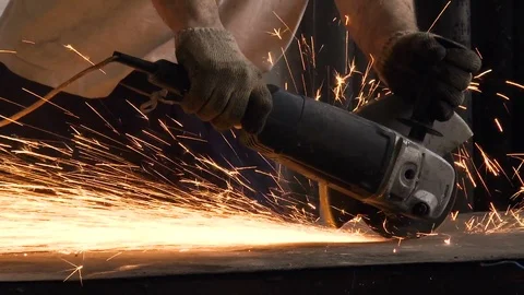 Man works as a grinder Stock Footage 78419419