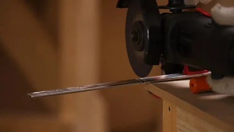 Man works as a grinder Stock Footage 79074077