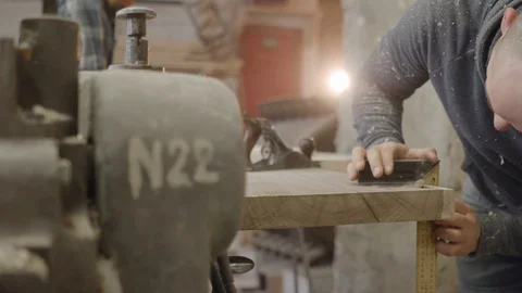 Man Works with Hand Jack-Plane and angle in Wood Workshop Stock Footage 107913219